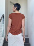 caraucci women's plant-based rayon jersey burnt orange lightweight loose fit top #color_copper