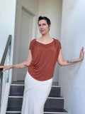 caraucci women's plant-based rayon jersey burnt orange lightweight loose fit top #color_copper