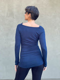 women's plant based rayon jersey long sleeve navy blue top with slight cowl neck and side ruching #color_navy