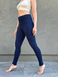 caraucci women's bamboo spandex full length navy blue pocket leggings with a fold over waistband #color_navy