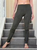 women's army green bamboo pants with raised stitch details and 2 zipper pockets #color_forest