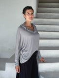 caraucci-woman-wearing-stone-dolman-cowl-top-in-lightweight-rayon-jersey #color_stone