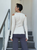 women's plant based stretchy rayon jersey long sleeve peekaboo shoulder cream top with thumbholes #color_cream