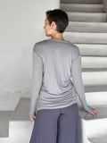 women's plant based rayon jersey lightweight light grey long sleeve top with thumbholes #color_stone