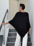 caraucci women's plant based rayon jersey black textured poncho can be worn multiple ways; dress, skirt, halter top #color_black