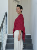 caraucci women's plant based rayon jersey red textured poncho can be worn multiple ways; dress, skirt, halter top #color_scarlet