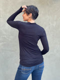 women's plant based rayon jersey lightweight long sleeve black top with thumbholes #color_black