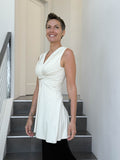 caraucci v neck sleeveless cream tunic with gathered bodice and flowing silhouette #color_cream